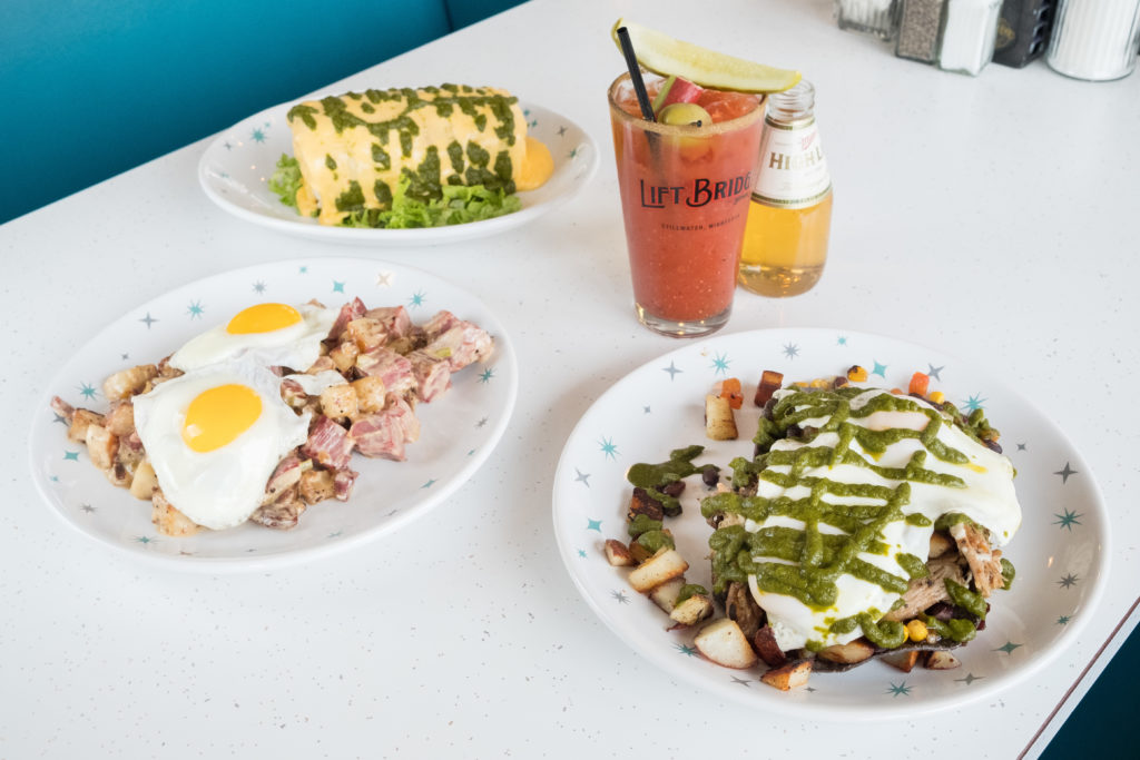 Breakfast dishes like huevos rancheros, corned beef hash, bloody mary, and breakfast burrito at Oasis Cafe in Stillwater Minnesota, photos by The Culinary Portfolio